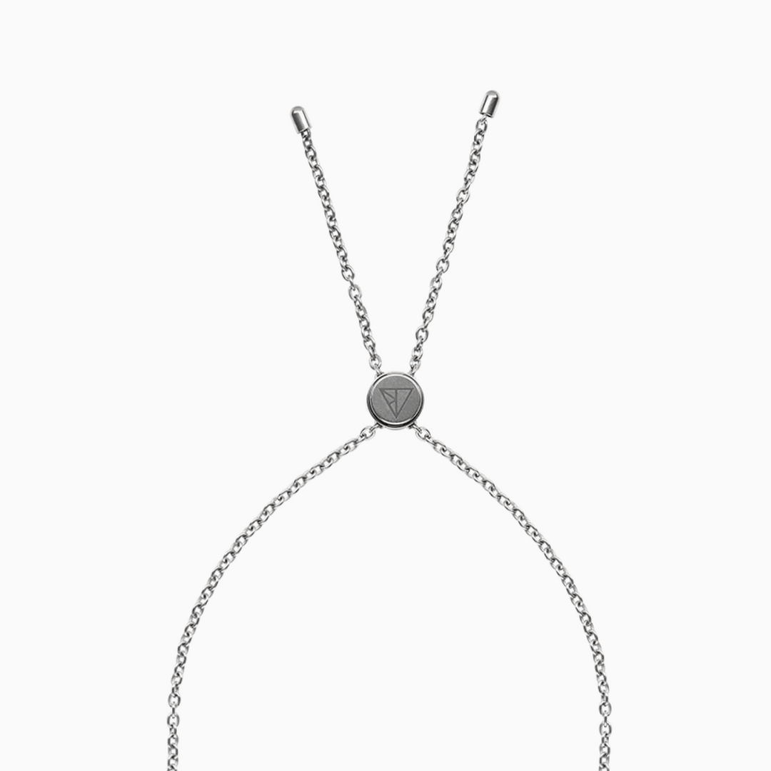 A half of a silver necklace with a circular clasp with triangle logo, to hold both ends