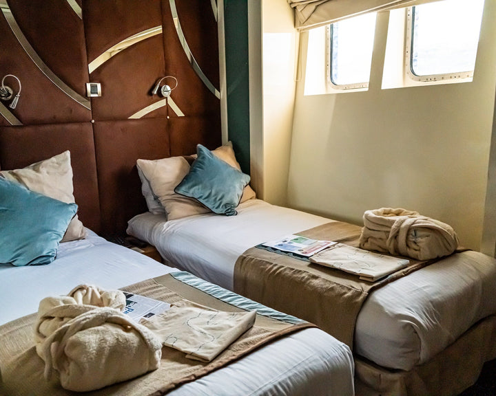 Window Cabin with twin beds aboard the M/Y Variety Voyager
