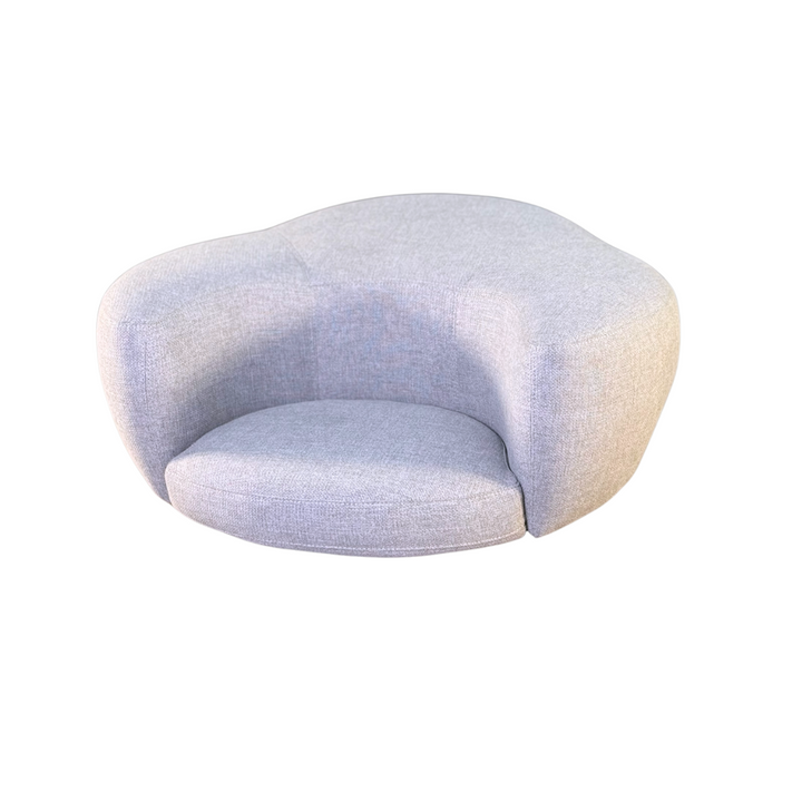 A 12.40 inches in height, white colored, half circle shaped cushion that seats 1 person