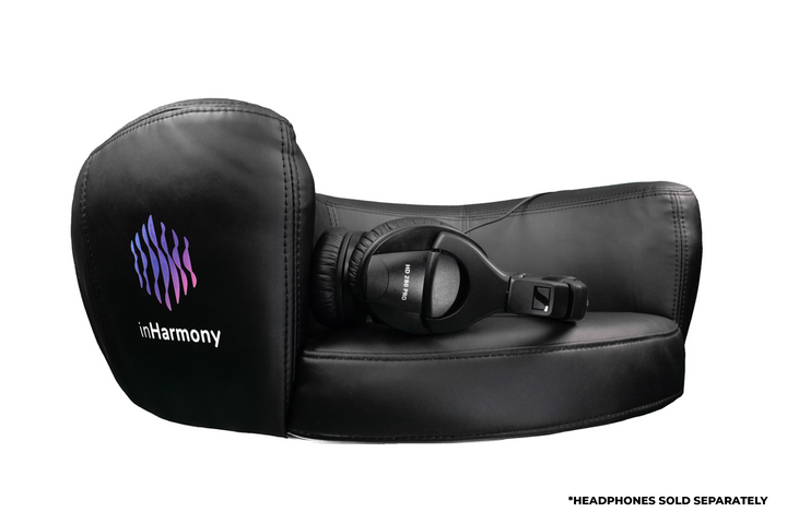 A level view of the cushion that shows its logo, a squiggly spaced vertical line with a text inHarmony. A line-in headphone rests at the seat. Below a disclaimer that says, headphones sold separately